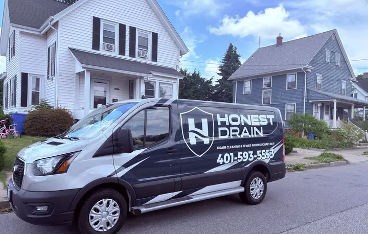 Honest Drain service van at a Rhode Island residential property